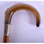 A 19TH CENTURY CONTINENTAL CARVED RHINOCEROS HORN HANDLED WALKING CANE. 88 cm long.