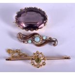 TWO ANTIQUE 9CT GOLD BROOCHES and a 15ct brooch. 17.1 grams. (3)