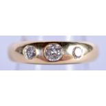 A HEAVY 18CT GOLD AND DIAMOND RING of approx 0.4 cts. 6.3 grams. J.