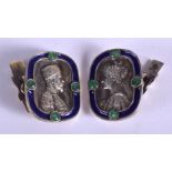A PAIR OF CONTINENTAL SILVER AND ENAMEL JEWELLED CUFFLINKS. 2.75 cm wide.