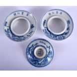 A PAIR OF 19TH CENTURY CHINESE BLUE AND WHITE PORCELAIN TEABOWL STANDS together with a matching lid.