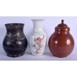 A 19TH CENTURY CHINESE FAMILLE ROSE VASE together with two cloisonné enamel vases. 21 cm high. (3)