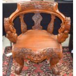 AN EARLY 20TH CENTURY JAPANESE MEIJI PERIOD DRAGON CHAIR. 79 cm x 64 cm.