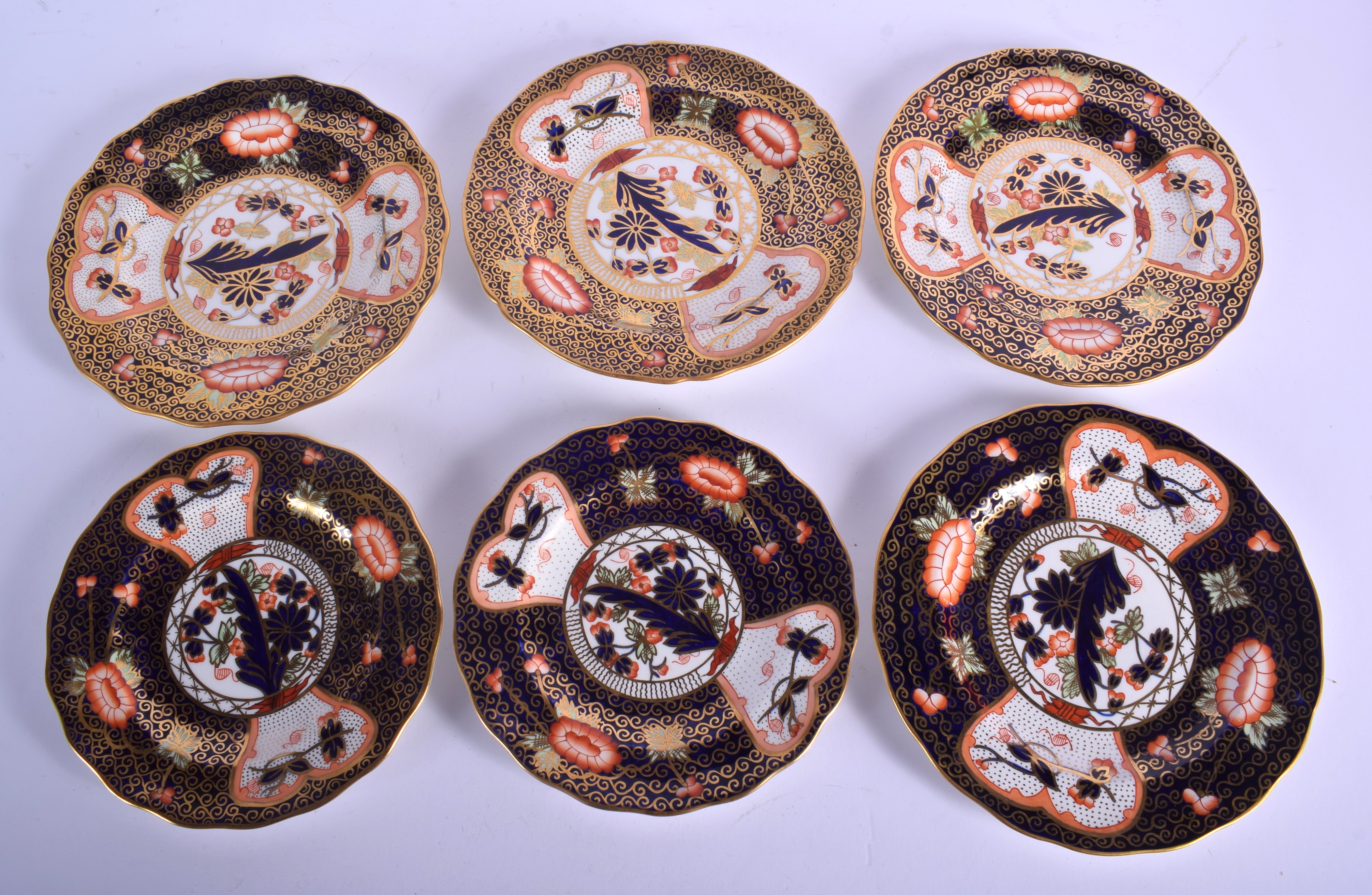 Royal Crown Derby rare pattern 4591 four medium plates and two small plates. Largest 18 cm wide. (6