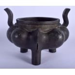 AN 18TH/19TH CENTURY CHINESE LOBED BRONZE CENSER Ming style, with high looping handles. 1863 grams.