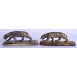 A PAIR OF 19TH CENTURY CONTINENTAL CARVED RHINOCEROS HORN TIGERS modelled upon rectangular bases. 17