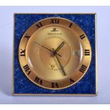 AN ART DECO JAEGER LE COULTRE LAPIS LAZULI TRAVELLING CLOCK with calender aperture. 4.5 cm square.