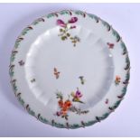 Chelsea feather edged plate painted with flowers, brick red anchor mark. 21 cm wide.