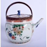 A 17TH/18TH CENTURY CHINESE FAMILLE VERTE TEAPOT AND COVER Kangxi, painted with flowers. 11 cm x 14