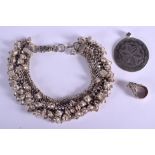 AN OMANI MIDDLE EASTERN SILVER NECKLACE with pendant and ring. 11.5 oz. (3)