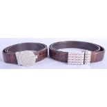 TWO SILVER AND DIAMONTE CROCODILE SKIN LEATHER BELTS. 122 cm long. (2)
