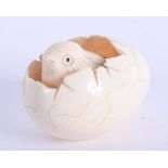 AN EARLY 20TH CENTURY JAPANESE MEIJI PERIOD CARVED IVORY HATCHING EGG OKIMONO. 3 cm x 1.5 cm.