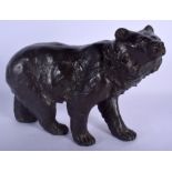 A 19TH CENTURY JAPANESE MEIJI PERIOD BRONZE OKIMONO modelled as a roaming bear. 29 cm x 23 cm.