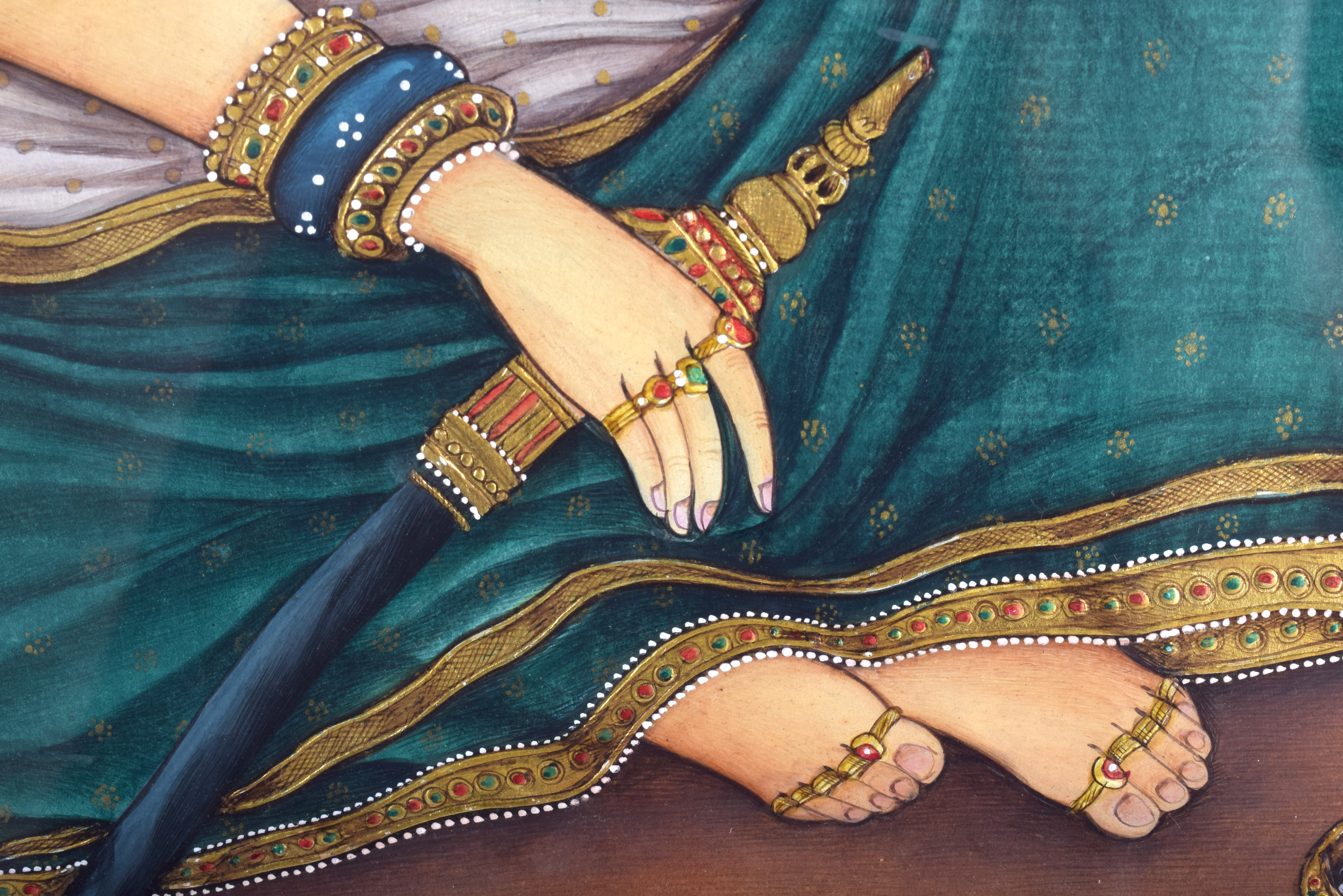 AN EARLY 20TH CENTURY INDIAN RAJASTHANI PAINTED WATERCOLOUR depicting a female smoking a pipe. Image - Image 3 of 4