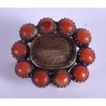 AN EARLY VICTORIAN CORAL MOURNING BROOCH. 2 cm x 1.5 cm.