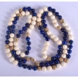 AN EARLY 20TH CENTURY GOLD IVORY AND LAPIS LAZULI NECKLACE possibly from the Chinese court. 130 cm l