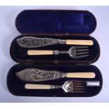 TWO CASED PAIRS OF ANTIQUE SILVER BLADED CUTLERY. Sheffield 1874 & 1902. 15.5 oz overall. (4)