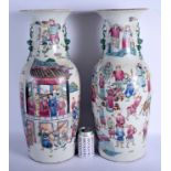 A VERY LARGE PAIR OF EARLY 20TH CENTURY CHINESE FAMILLE ROSE VASES Late Qing/Republic. 55 cm x 15 cm