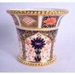 Royal Crown Derby pattern 1128 gadroon vase. 12 cm high.