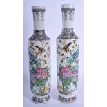 A PAIR OF CHINESE FAMILLE ROSE PORCELAIN VASES 20th Century, painted with birds amongst foliage. 25