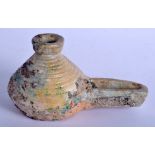 A 12TH CENTURY PERSIAN IRANIAN TURQUOISE GLAZED OIL LAMP Kashan. 19 cm wide.