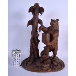 A LARGE 19TH CENTURY BAVARIAN BLACK FOREST CARVED WOOD FIGURAL GROUP modelled as a two bears standin