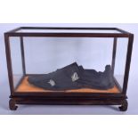 A 16TH CENTURY CONTINENTAL LEATHER SHOE within a later glass case. Shoe 19 cm wide.
