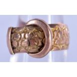 A 9CT GOLD BUCKLE RING. 4.4 grams. N.