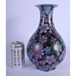 AN EARLY 20TH CENTURY CHINESE FAMILLE ROSE ENAMELLED YUHUCHUMPING VASE bearing Qianlong marks to bas