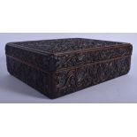 A FINE CHINESE QING DYNASTY CARVED HONGMU HARDWOOD BOX AND COVER decorated with bold foliage and tra