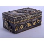 A 19TH CENTURY JAPANESE MEIJI PERIOD GOLD ONLAID RECTANGULAR BOX decorated with figures within lands