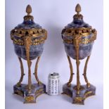 A RARE PAIR OF 19TH CENTURY CONTINENTAL GILT BRONZE AND FLUORITE VASES AND COVERS possibly Derbyshir