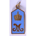 A CONTINENTAL SILVER AND ENAMEL CROWN PENDANT. 2 cm x 3.25 cm.