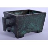 A CHINESE TWIN HANDLED BRONZE CENSER 20th Century, bearing Xuande marks to base. 2027 grams. 18 cm w