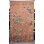 A VERY LARGE 19TH CENTURY CHINESE ORANGE SILKWORK PANEL Qing, depicting figures in various pursuits.