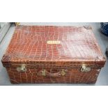 A LARGE ANTIQUE CROCODILE SKIN LEATHER SUITCASE with initialled monogram to top. 75 cm x 30 cm x 50
