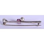 A RARE ANTIQUE SILVER AND AMETHYST GOLF CLUB BROOCH. 5.5 cm wide.