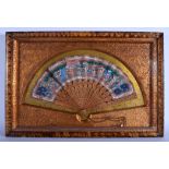 A LARGE 19TH CENTURY CHINESE CASED SANDALWOOD WATERCOLOUR FAN painted with figures and landscapes. F
