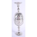 AN ANTIQUE CONTINENTAL SILVER DOUBLED ENDED STACKING CUPS possibly for wagering, decorated with putt