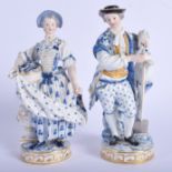 A PAIR OF 19TH CENTURY MEISSEN PORCELAIN FIGURE OF A MALE AND FEMALE painted with flowers. 19 cm hig