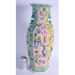 A LARGE CHINESE FAMILLE ROSE STRAITS VASE 20th Century, painted in relief with precious objects and