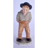 Royal Worcester figure of a man with a large brimmed hat and his hands in his pockets from the Down