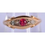 AN ANTIQUE 18CT GOLD AND RUBY RING. 2.2 grams. Q.