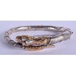 A LOVELY ANTIQUE GOLD RUBY AND PEARL SNAKE BANGLE of fine quality coiled form. 45.8 grams. 7 cm wide