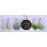 AN EARLY 20TH CENTURY CHINESE GOLD MOUNTED JADEITE PENDANT together with five jadeite carvings. (6)