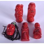 FOUR EARLY 20TH CENTURY CHINESE CORAL FIGURES and a skull necklace. (5)