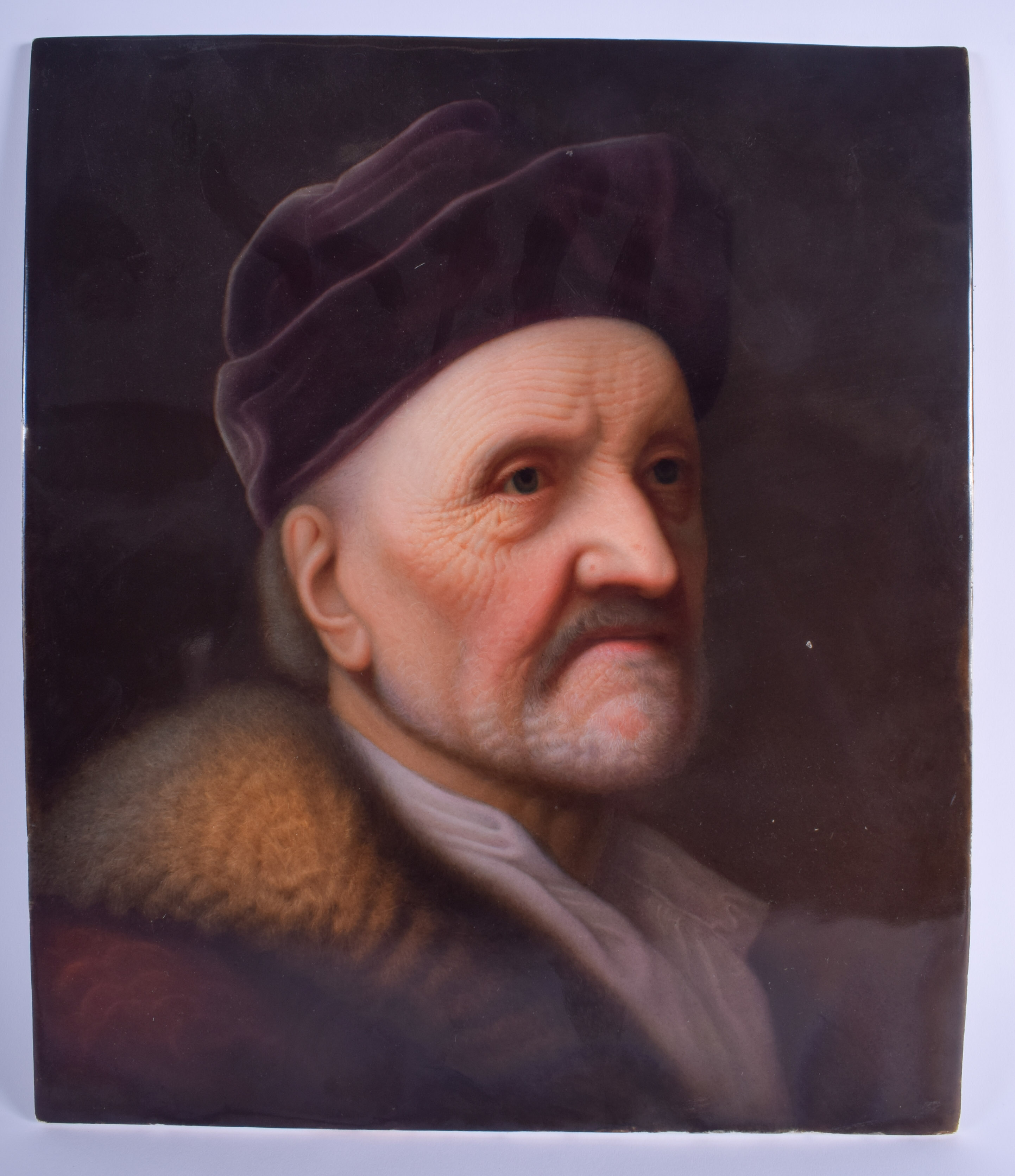 A FINE LARGE ANTIQUE KPM PORCELAIN PLAQUE painted with a bearded male wearing a felt hat. 41 cm x 33