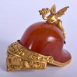 A FINE 19TH CENTURY ENGLISH ORMOLU AND AGATE HELMET probably a desk accessory, with dragon finial. 6