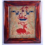 A MID 19TH CENTURY ENGLISH FRAMED SAMPLER decorated with a seated red deer. Sampler 21 cm x 24 cm.