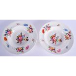 A PAIR OF EARLY 19TH CENTURY COALPORT PORCELAIN BOWLS London decorated, painted with flowers. 24 cm